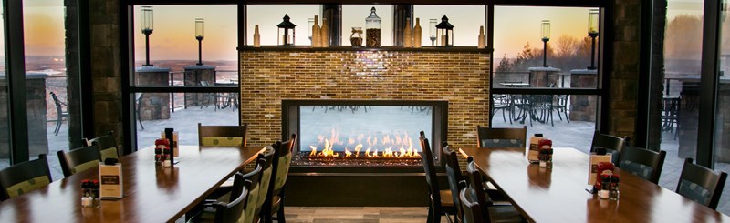 Eat a meal with your friends in front of a fire - one of the reasons why a ski trip makes a perfect girlfriend getaway