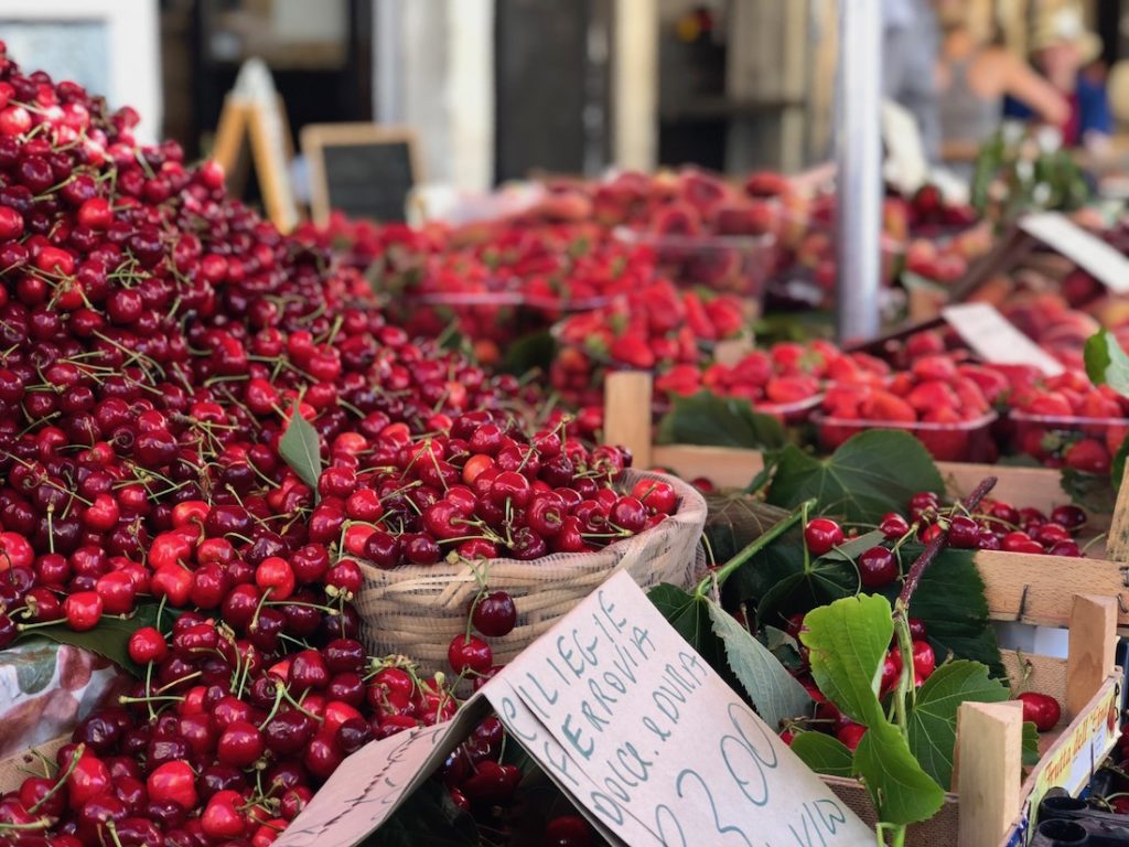 What to eat in Sicily, when it’s tempting to eat it all? World SheBuysTravel says Sicily travel has to include arancini, granita, cannoli, and more.