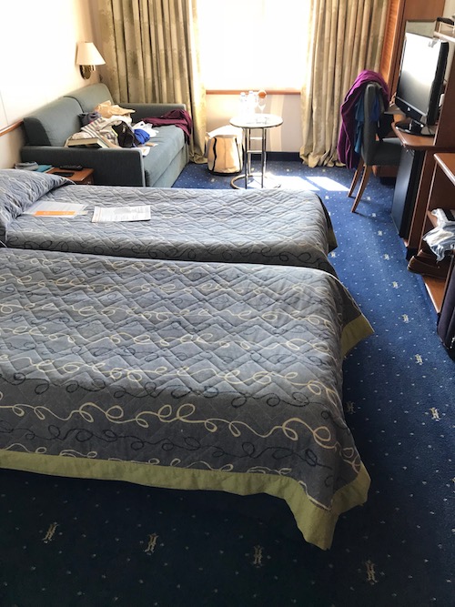 Celestyal cruises stateroom with two beds and plenty of room.