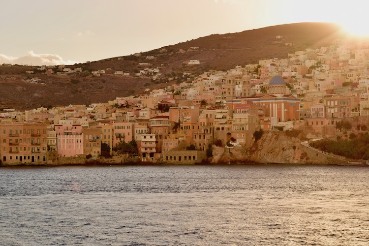 Syros harbor at sunset captured on a Greek island hopping cruise aboard Celestyal Cruises idyllic aegean