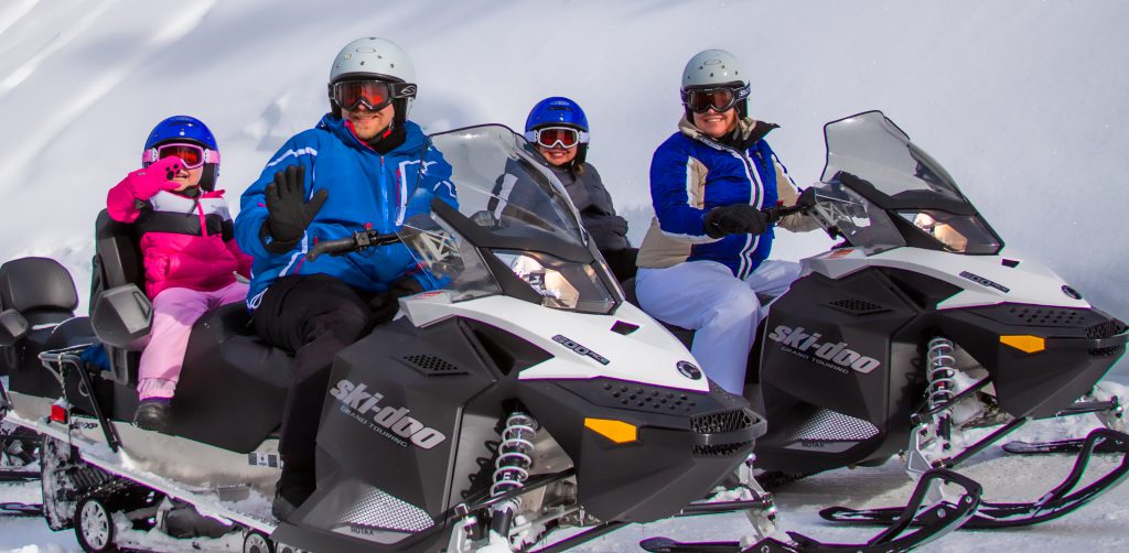 Grand Lake offers more than 100 miles of trails for intermediate to advanced snowmobiling. Photo: Grand Adventures