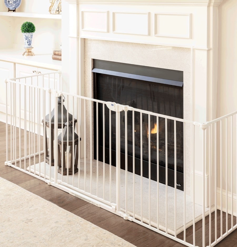 gate in front of a fireplace to baby proof