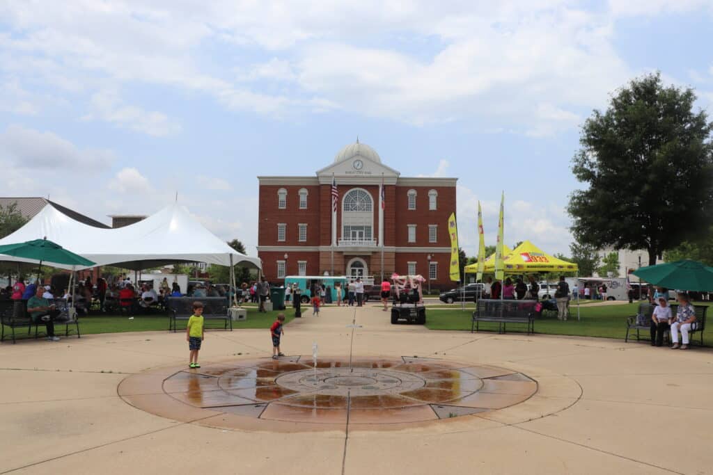 Children playing in a fountain in Tupelo MS