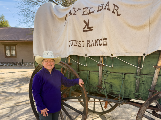 Julie, the author, at the Kay El Bar Guest Ranch sporting a new straw cowboy hat.