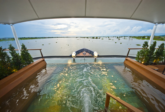 Plunge pool looking out over bow of ship to Mekong River.