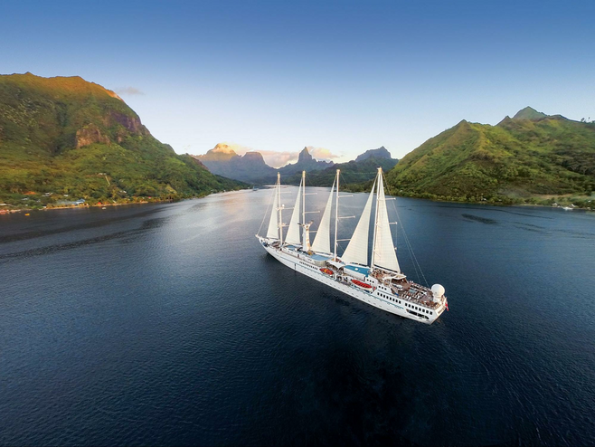 A Windstar Cruises Sailboat in a harbor
