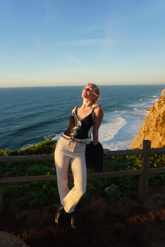 Hudson soaking up the sun in the coast of Lisbon, Portugal.