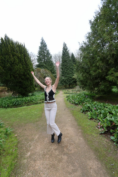 Hudson jumping with joy in the gardens of Lisbon, Portugal.