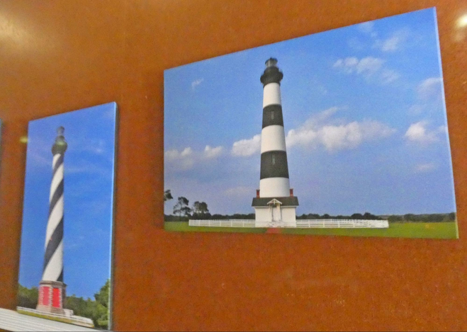 Two lighthouse paintings