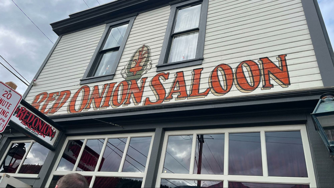 Outside the building of Red Onion Saloon.