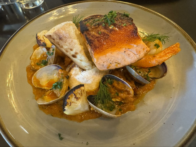 Clams, shrimp, fish, and chorizo dish at Liberty Food and Wine Exchange