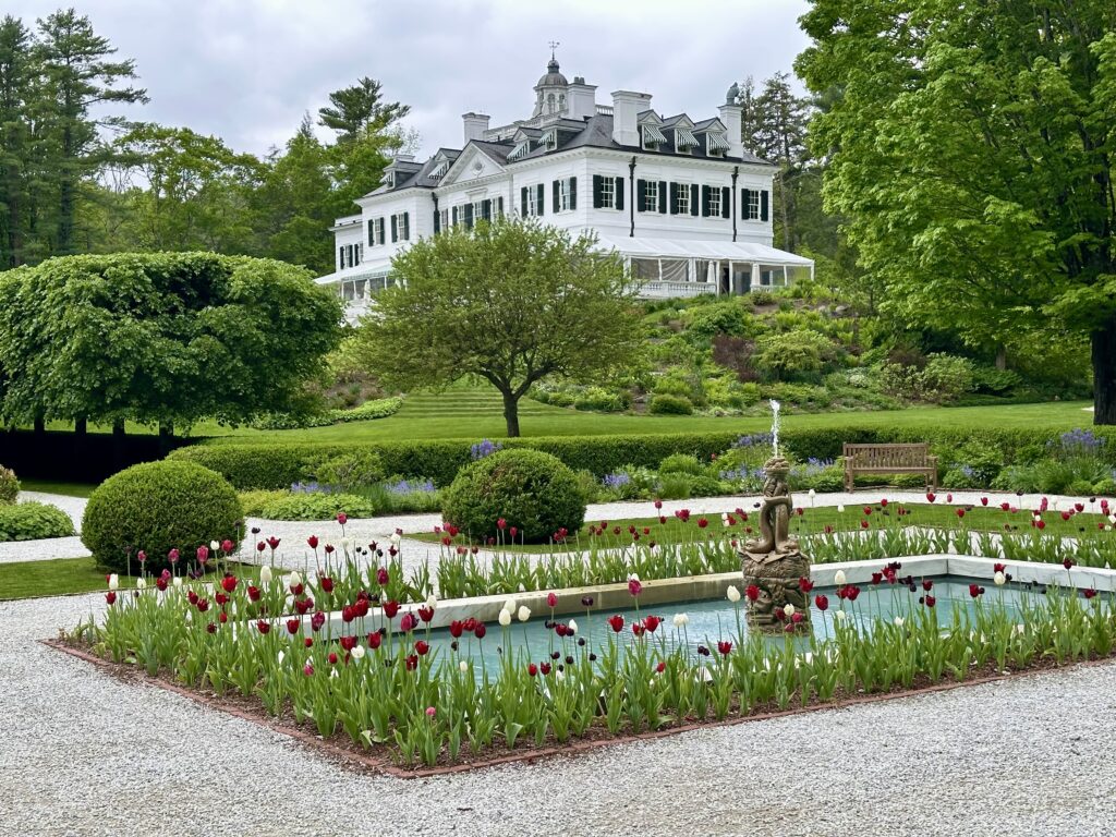 Edith Wharton's Lenox MA home, The Mount, with formal garden in the foreground.
