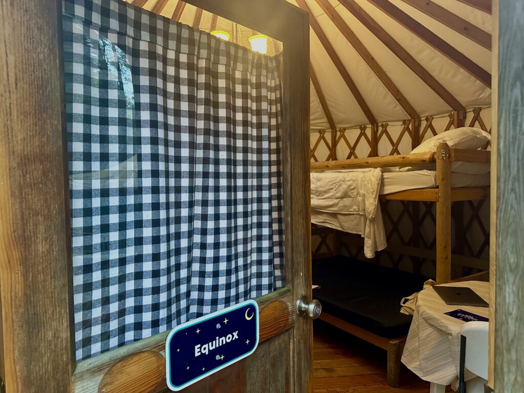 Bunk bed inside a camping yurt at Spacious Skies Adirondack Peaks.