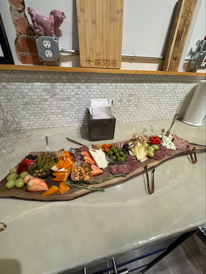 Party platter with cheese, charcuterie and fresh local produce.