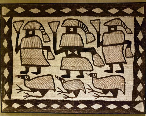 A large fabric square with three birds in a horizontal line and three people above them is bordered by beige triangles on dark brown fabric. 