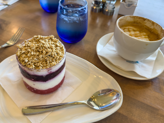 Hammock Beach Resort breakfast parfait and latte on the table.