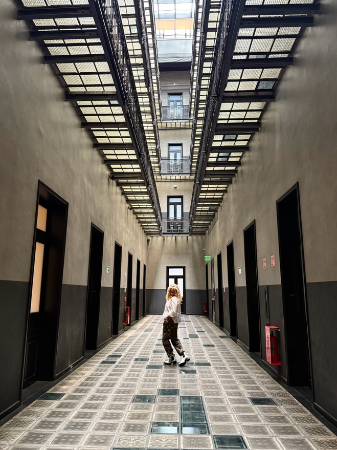 The hall way in the renovated office building of Umbral Hotel.