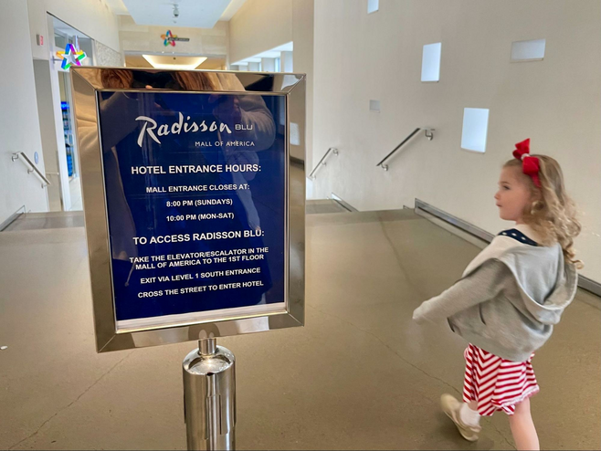 Girl walks into Mall of America from the Radisson Blu skyway