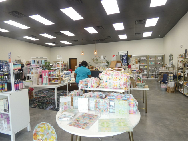Woman browsing the items at Hello Retail Therapy
