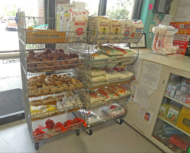 Bins of produce and rice.