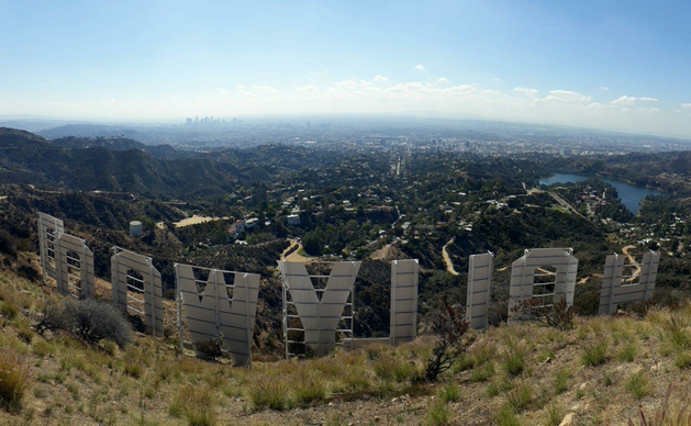 Looking out over back of Hollywood sign and Los Angeles city