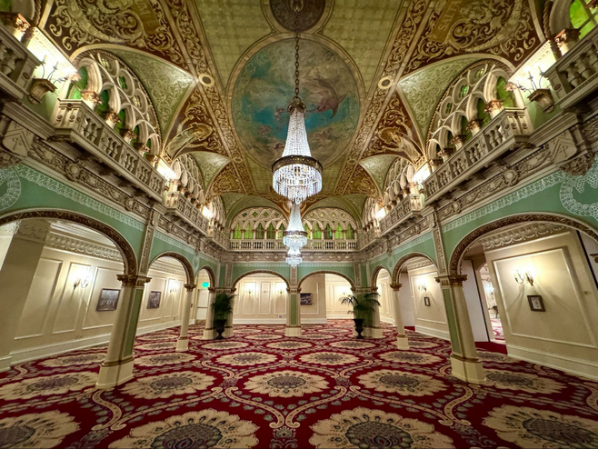 The Hall of Doges is a historic room moved to the Davenport and put inside of a ballroom. It has arches and pillars with an ornate painted ceiling.