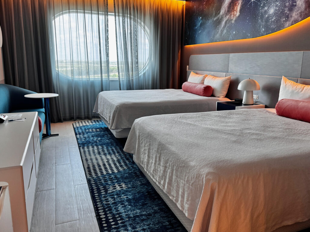 Standard space-themed room with 2 queen beds at Stella Nova Resort, Universal Orlando.