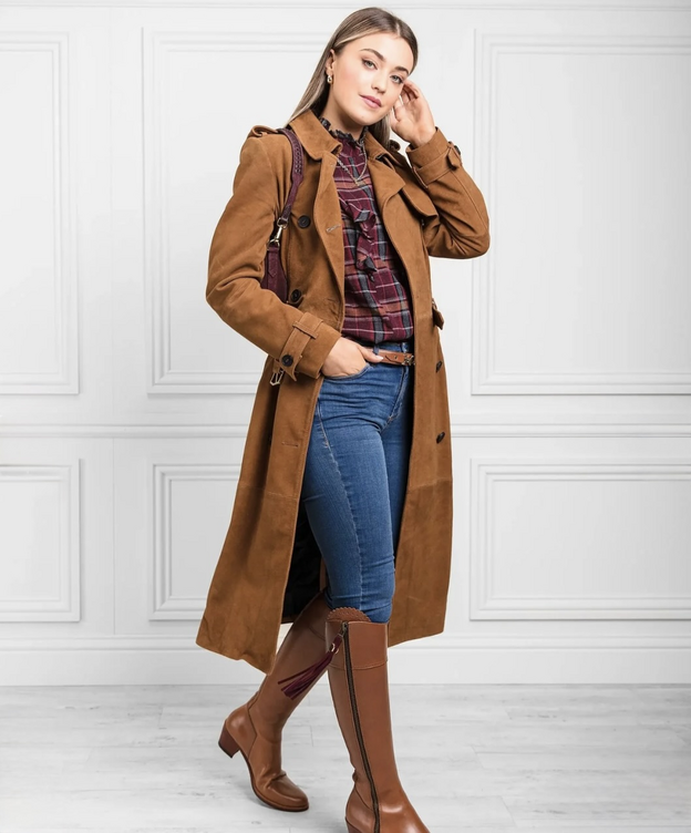 Woman wearing a chestnut color suede trench coat