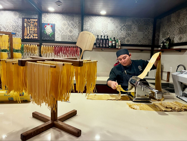 Fresh pasta dries on racks