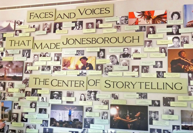 A wall of photos about storytellers who performed in Jonesborough.