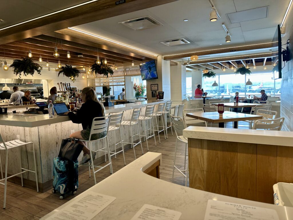 Beachy interior of Summer House restaurant in Charlotte's airport.