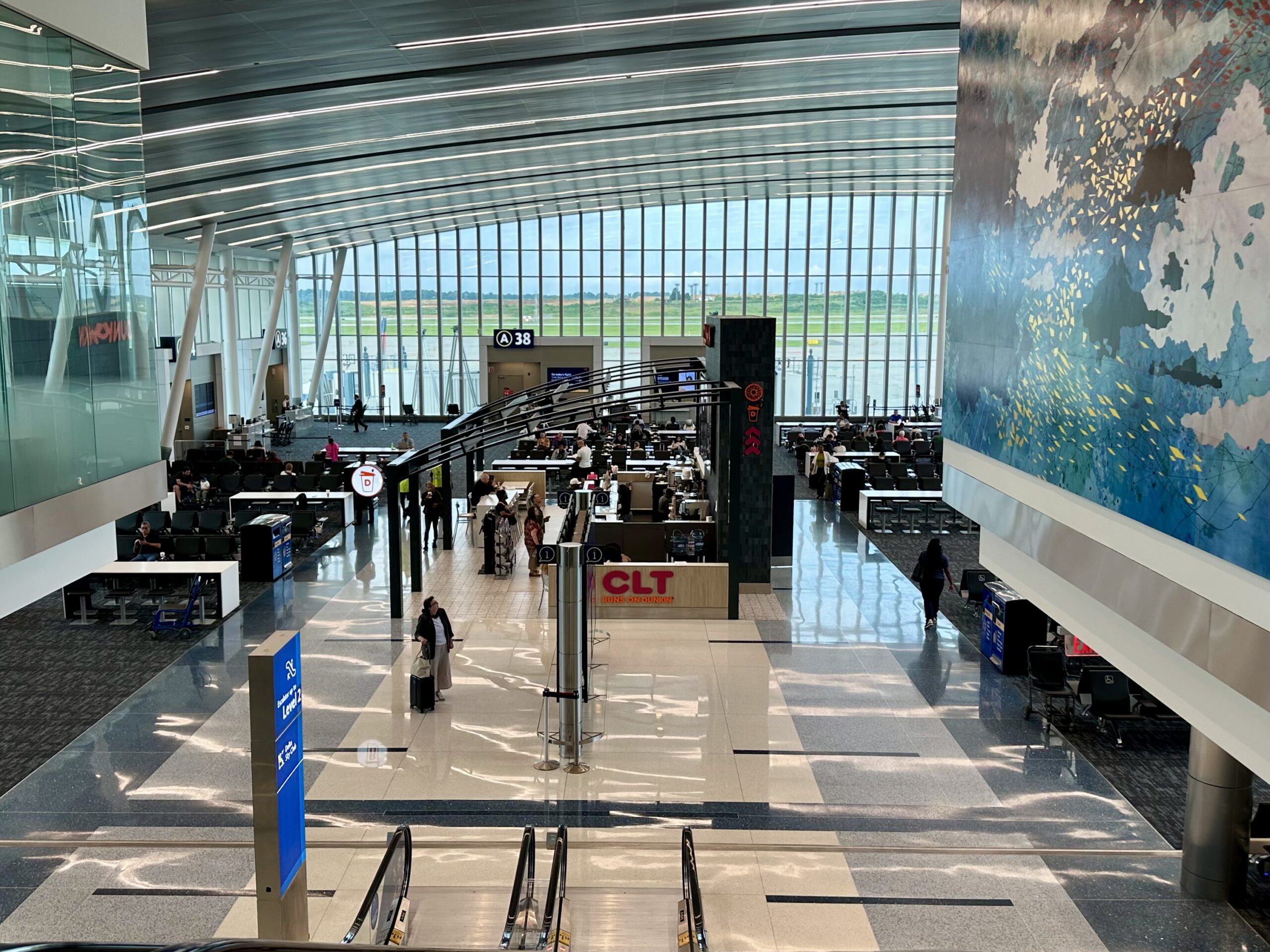 Soaring interior of the Delta area of Concourse A at Charlotte's airport.
