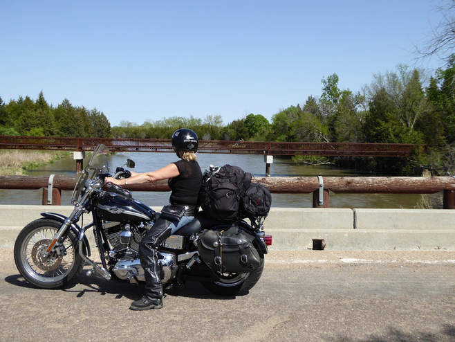 Woman motorcycle rider packed for Sturgis