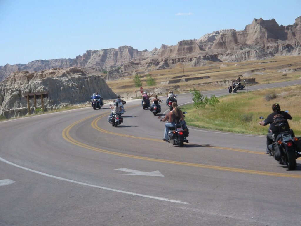Harley riders on the road through the Badlands National Park