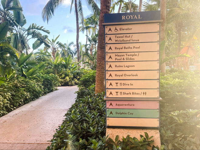 Wayfinding sign along a pathway at Atlantis.