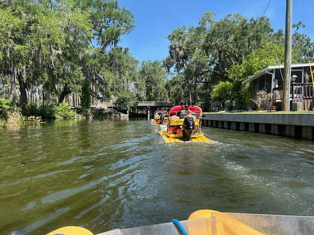 Boating slowly through the canals on a Cat Boat Adventure. 