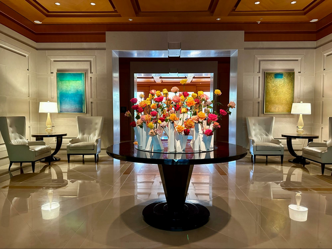 Umstead hotel lobby with dramatic rose centerpiece.