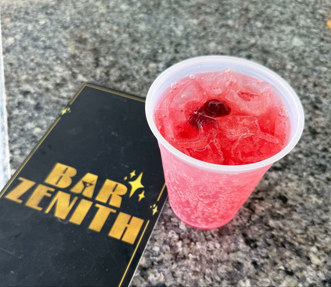 Bar Zenith menu with cherry mocktail beverage