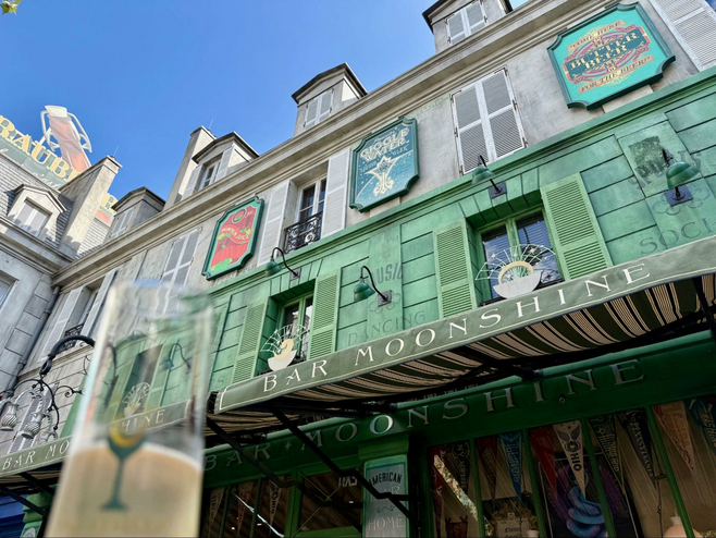 Bar Moonshine entrance with sparkling wine cocktail