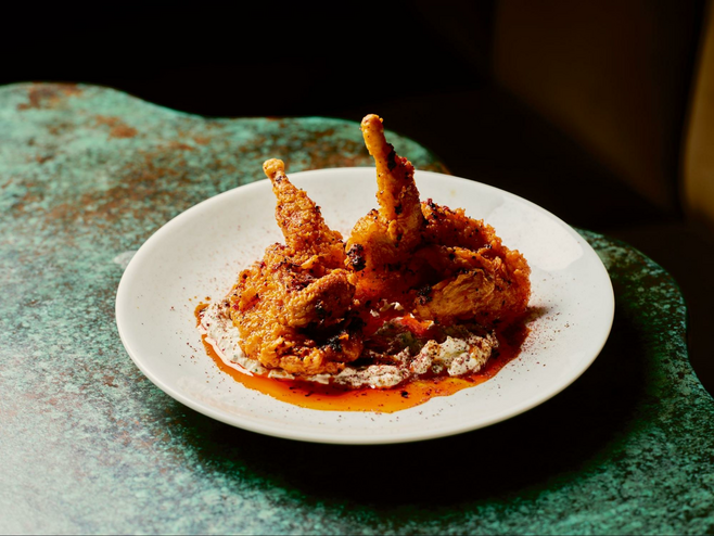 Plate of crispy quail at Albertine restaurant in Charlotte, SC