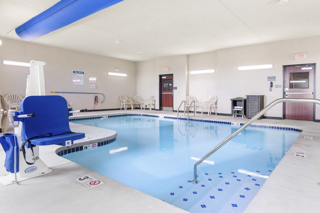 Indoor swimming pool at family-friendly Cobblestone Hotel