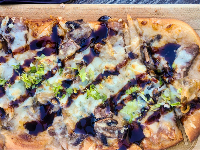 Flatbread with steak, mushrooms and cheese from Wissota Chophouse