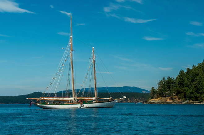 A tall ship at anchor.