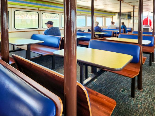Tables and chairs inside the ship