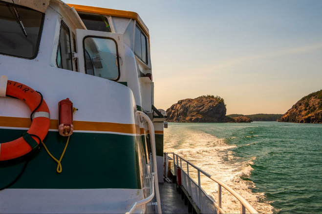 Ship motoring near islets in San Juan Islands