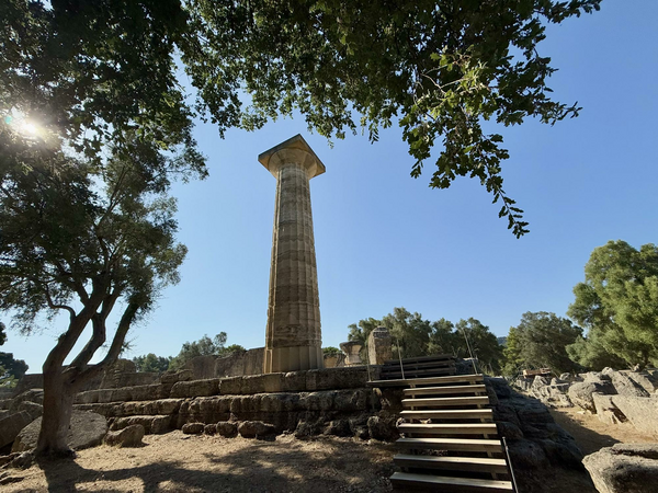 Looking up hill to ancient columns and ruins.