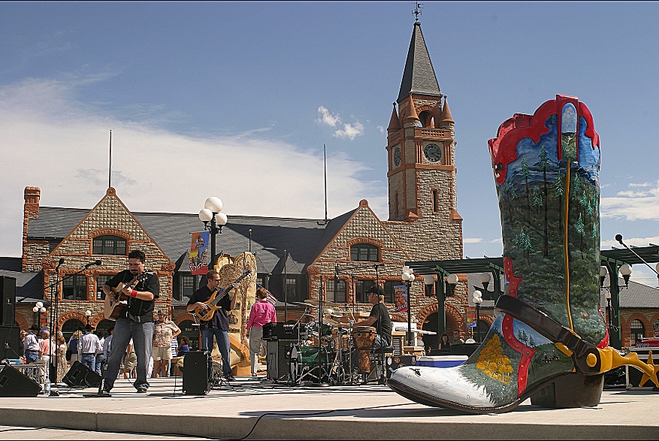 Concert in front of Depot and cowboy boot sculpture in Cheyenne