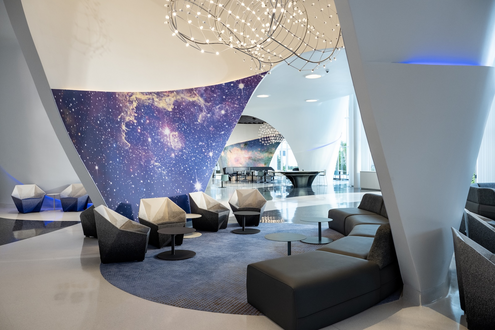 Space-themed mural and futuristic furniture at Universal Stella Nova Resort.