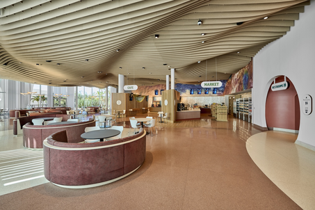 Universal Terra Luna Resort lobby with booths for dining and a market and cafe for grabbing quick meals and snacks.