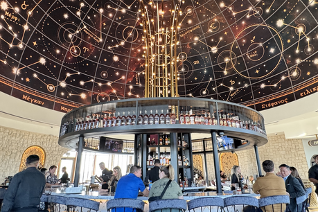 Hotel bar with constellations painted on the domed ceiling at Universal Helios Grand Hotel.